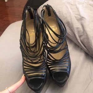 Christian Louboutin black pumps
